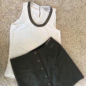 Sleeveless embellished white top